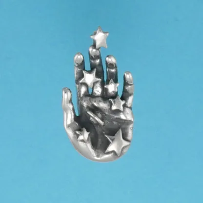 Microsculptures 0919 Hand Holding Heavens Silver Pendant